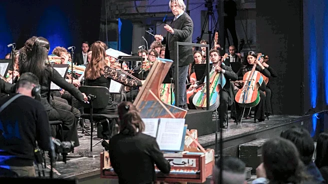 Milan prison hosts concert with instruments made by inmates from migrant smugglers’ boats