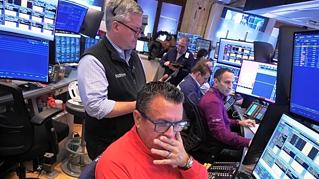 Wall Street hangs near its records as JPMorgan Chase and Delta kick off earnings season