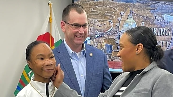 Dog warden and his hero, Avery Russell, 12, honored for strengthening vicious-dog law