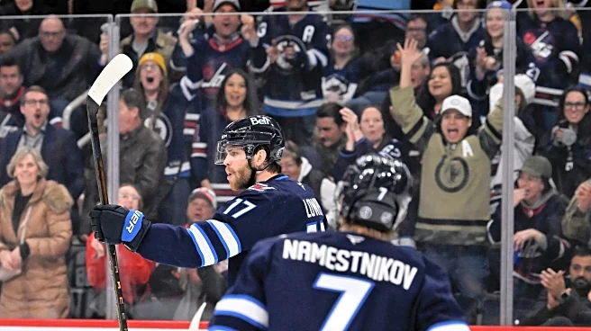 Lowry, Connor each have goal and assist as Jets beat Islanders 5-4 for their 3rd straight win