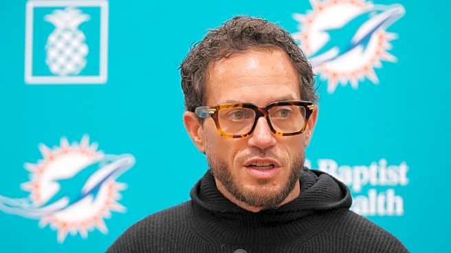 Titans continue coaching search by interviewing former Miami coach Mike McDaniel, AP source says