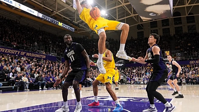 No. 4 Michigan rebounds from 1st loss with 82-72 win at Washington