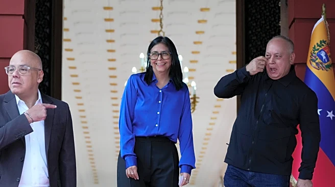 Venezuela’s new leader faces competing pressures from the US and a government loyal to Maduro