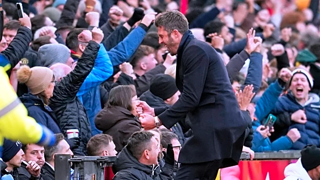 Man United stuns Man City in Carrick's first game and Liverpool and Arsenal drop points