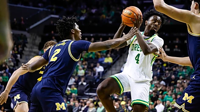 Elliot Cadeau scores 17 points to lead No. 4 Michigan over Oregon 81-71