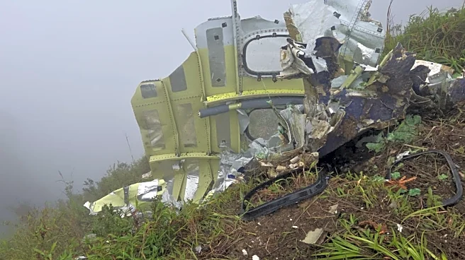 Indonesian rescuers find a body near wreckage of a plane that crashed with 11 aboard