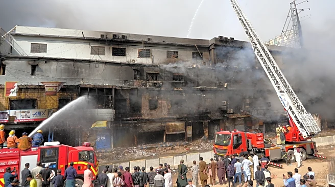 Death toll in Karachi shopping plaza fire rises to 11 as search continues for about 60 missing