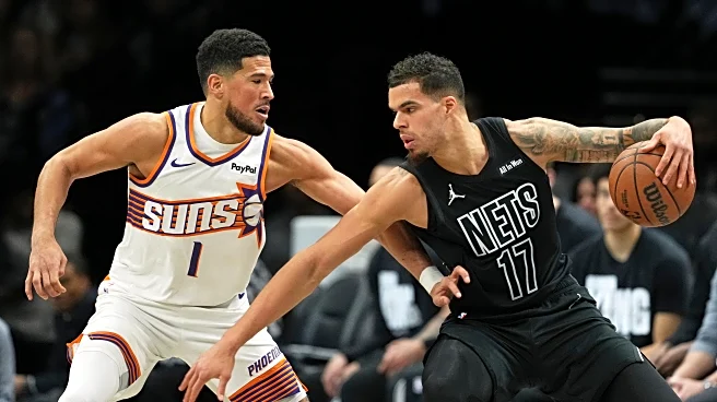 Brooks and Booker power Suns to a 126-117 win over the struggling Nets