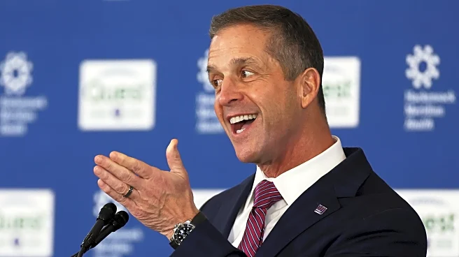 New coach John Harbaugh embraces the challenge of turning the Giants back into contenders