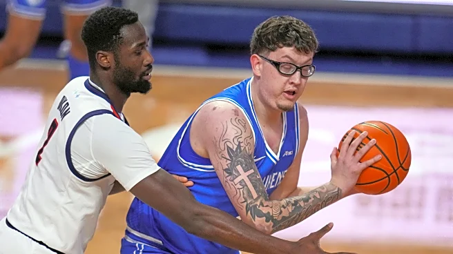 No. 24 Saint Louis pushes win streak to 12 by holding off Duquesne 81-77