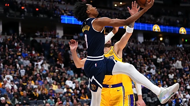 Doncic has a triple-double as the Lakers rally past the short-handed Nuggets, 115-107