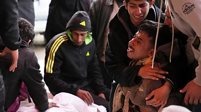 Israeli fire kills 11 Palestinians in Gaza, including two children, local hospital officials say