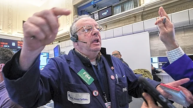 Wall Street holds steadier after Trump says he won't use force to take Greenland