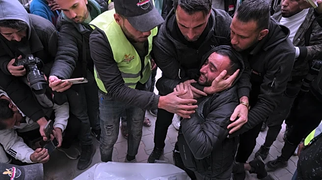 Israeli fire kills 11 Palestinians in Gaza, including 2 children, local hospital officials say