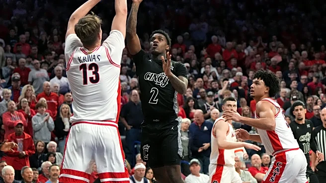 No. 1 Arizona pulls away late to top Cincinnati 77-51 and remain 1 of 3 unbeatens in country