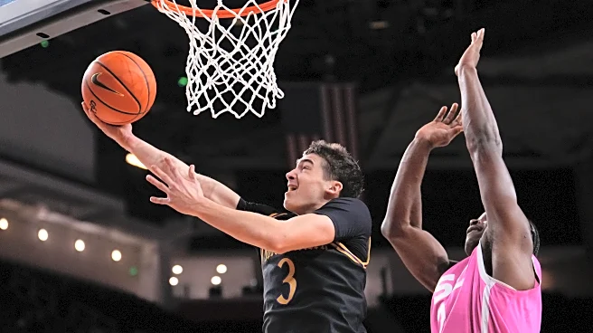 Martinelli's 22 help Northwestern beat USC 74-68, snap 9-game skid in Big Ten play