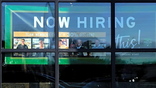 US applications for jobless benefits inch up last week to a still-low 200,000