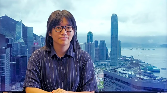 Hong Kong vigil organizer says she was seeking democracy, not end to Communist Party rule