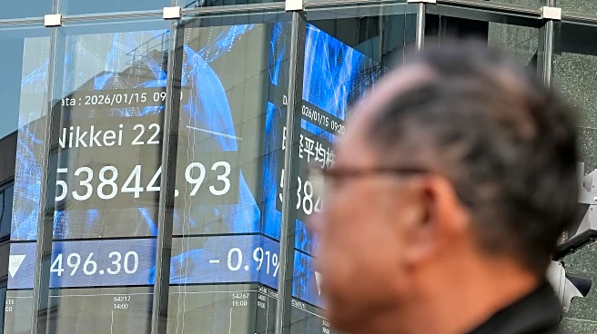 US futures slip and world shares are mixed as Japan keeps its key interest rate unchanged
