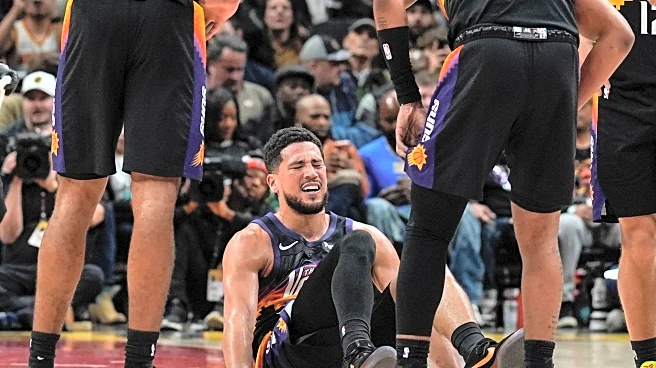 Suns' Devin Booker rolls his ankle and Jalen Green also hurt in loss to Hawks