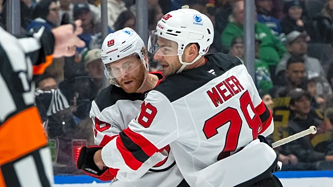 Cody Glass has 2 goals and an assist in Devils' 5-4 win over Canucks