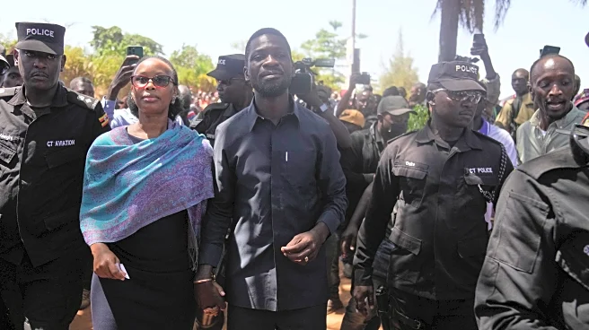 Wife of Uganda's opposition leader describes moment armed men attacked her at home