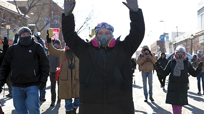 From frigid quiet to outraged sorrow, a few hours on Minneapolis street where agents killed man