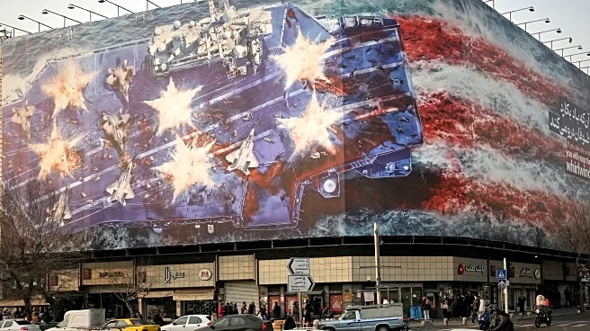 Iran unveils mural warning of retaliation if US conducts a military strike