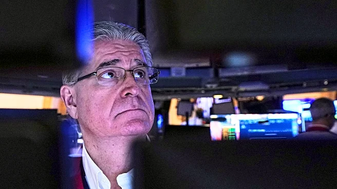 Wall Street retreats modestly ahead of earnings and Federal Reserve meeting