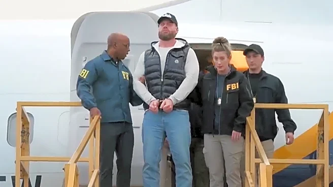 Ex-Olympic snowboarder pleads not guilty to running a drug smuggling ring