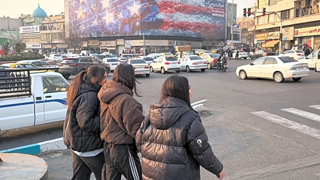 Iran’s currency falls to a record low after nationwide protests sparked by economic woes