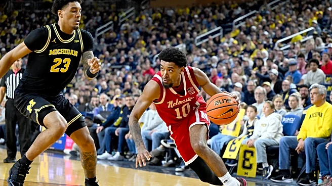 McKenney makes go-ahead layup as No. 3 Michigan hands No. 5 Nebraska its first loss, 75-72