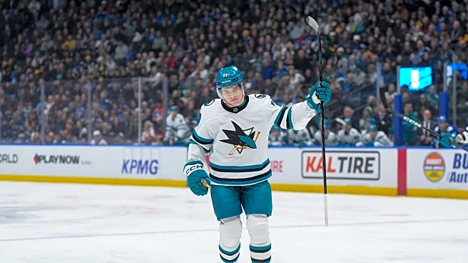 Celebrini's 4 points lead Sharks to 5-2 win over Canucks