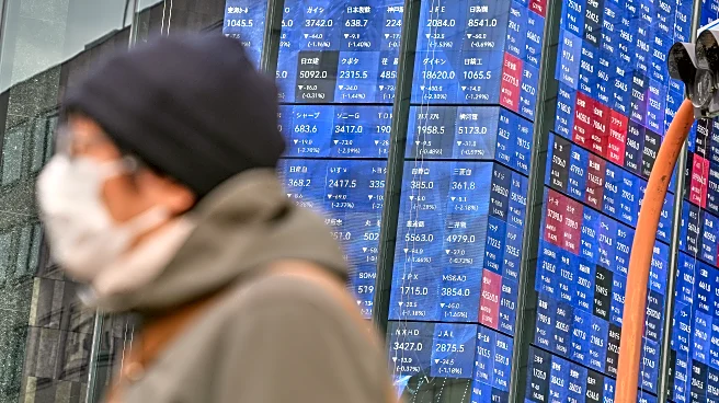 Asian shares mostly gain after Wall St sets a record, while gold and silver fly higher