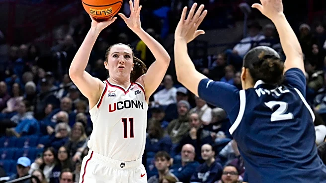Ziebell leads UConn to 50th consecutive Big East regular-season victory, beating Xavier 97-39