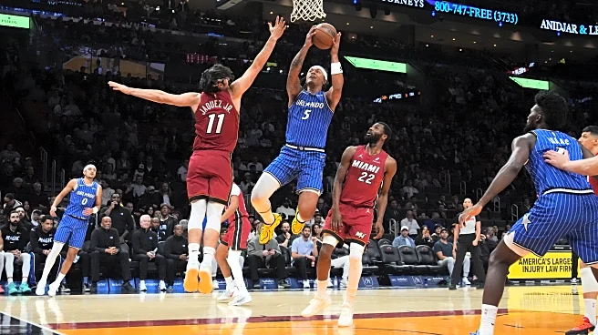 Paolo Banchero and Anthony Black lead Magic past Heat 133-124 to snap 4-game skid