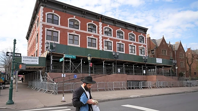 Car rams into Chabad headquarters in New York City, damaging doors