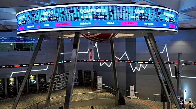 Asian shares trade mixed and gold jumps more than 4% after the Fed keeps rates unchanged