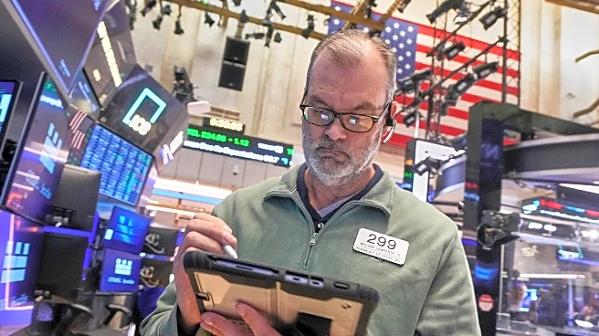 Microsoft yanks Wall Street lower as gold's price suddenly swings sharply