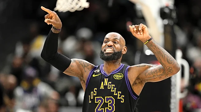 Doncic and James lead the way, and the Lakers shoot 61% from the field in a 142-111 rout of Wizards