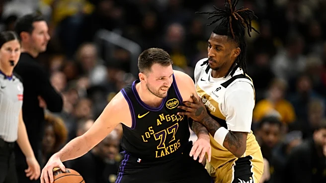 Luka Doncic has a triple-double (26 points, 11 assists, 10 rebounds) before halftime as Lakers roll