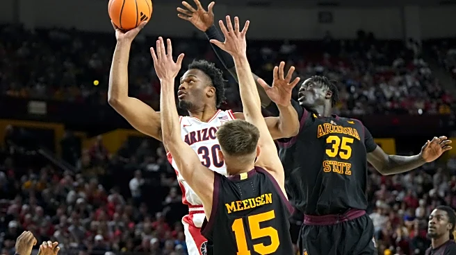 No. 1 Arizona sets school record with 22nd straight win to start season, beating Arizona State 87-74