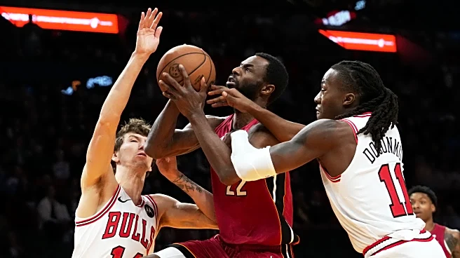Ayo Dosunmu's season-high 29 points lead short-handed Bulls past Heat, 125-118