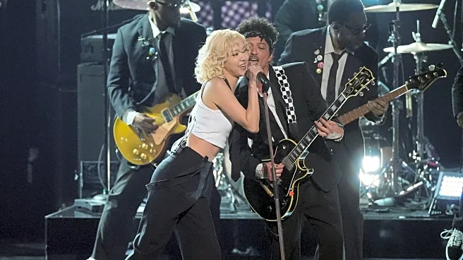 The Grammys had lots of Mars, Carpenter soaring and a near-naked Bieber. Here are some key moments