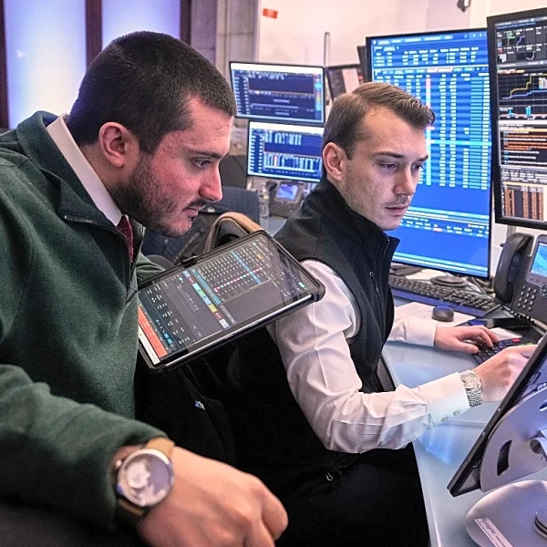 Wild swings across financial markets ease as Wall Street opens for trading