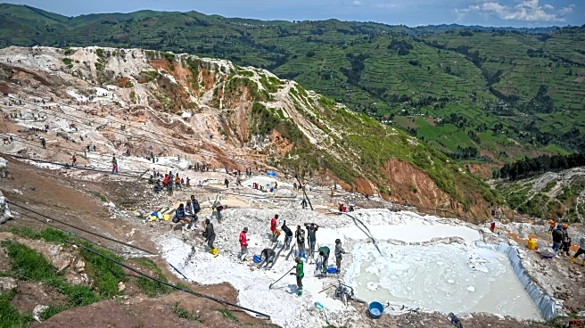 Families mourn those killed in a Congo mine landslide as some survivors prepare to return