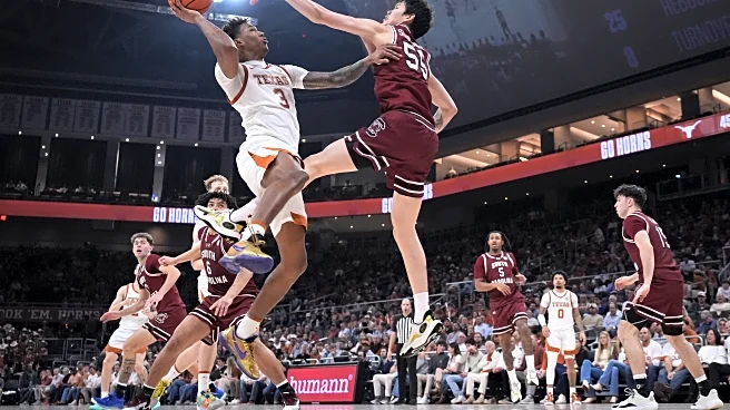Texas beats South Carolina behind Swain's 22 points, 10 rebounds
