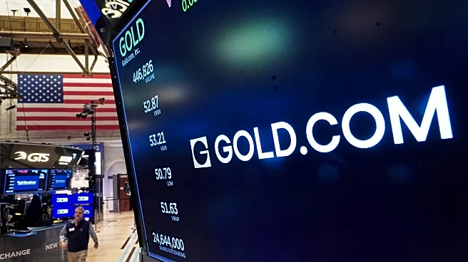 Asia shares mixed after Wall Street losses while gold and silver extend gains