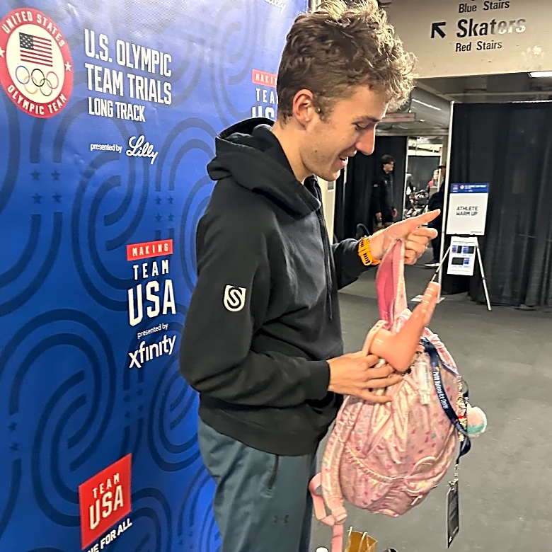 A pink backpack and an odd phone case are US Speedskating's fantasy football punishments