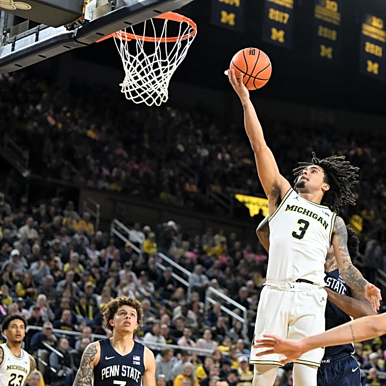 Burnett scores career-high 31, No. 2 Michigan routs Penn St 110-69 to reach school-record 21-1 mark